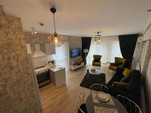 a living room with a couch and a table at King Suite BH37 in Istanbul