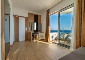 a hotel room with a view of the ocean at Kleopatra Celine Hotel in Alanya
