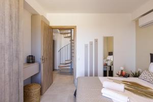 Ένα ή περισσότερα κρεβάτια σε δωμάτιο στο Villa Mariva , south Crete , Triopetra +25 φωτογραφίες