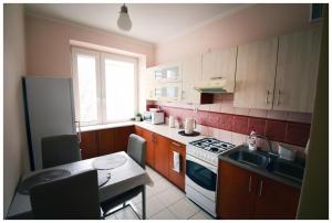 Η κουζίνα ή μικρή κουζίνα στο Color 24 Apartament IV