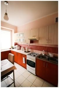 Küche/Küchenzeile in der Unterkunft Color 24 Apartament IV