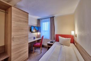 Postelja oz. postelje v sobi nastanitve Hotel Elbparadies