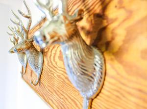 a silver trophy of a deer on a table at Lotus Oasis I Nature Experience in Torre