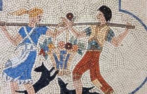 a mosaic of a man swinging a baseball bat at Hotel La Floridiana in Capri