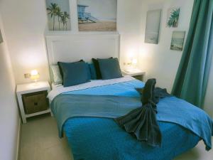 Posteľ alebo postele v izbe v ubytovaní Sage Palm Apartment BY NAMASTE ELITE + 37 fotografií