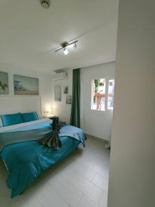 Posteľ alebo postele v izbe v ubytovaní Sage Palm Apartment BY NAMASTE ELITE