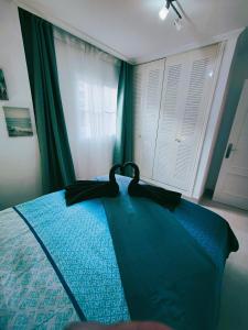 Posteľ alebo postele v izbe v ubytovaní Sage Palm Apartment BY NAMASTE ELITE