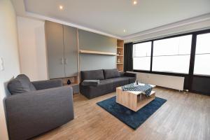 Ein Sitzbereich in der Unterkunft Haus "Jan am Strand" Appartement JAN002