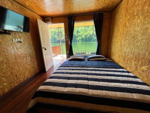 Postel nebo postele na pokoji v ubytování Phu Naphat Resort
