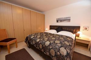 Een bed of bedden in een kamer bij Haus "Jan am Strand" Appartement JAN416