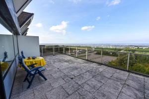 Ein Balkon oder eine Terrasse in der Unterkunft Haus "Jan am Strand" Appartement JAN504