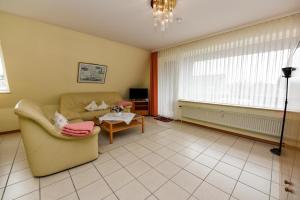 Ein Sitzbereich in der Unterkunft Haus "Luv und Lee" Appartement LUV23