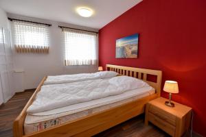 Postel nebo postele na pokoji v ubytování Haus "Nautilus" Appartement NAU08