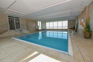 a large swimming pool in a building at Haus "Panorama" Appartement PAN086 in Duhnen