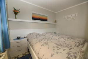 Postel nebo postele na pokoji v ubytování Appartementhaus "Pavillon" Appartement PAV02