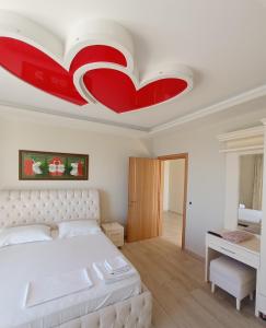 Apartments Romario tesisinde bir odada yatak veya yataklar
