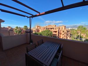 A balcony or terrace at Albatros Apartamentos Playa Granada