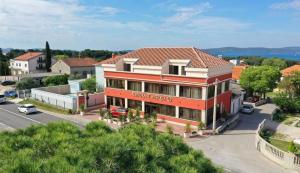 an aerial view of a building in a town at Residence Antiqua Rooms in Bibinje