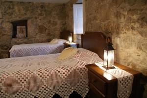Voodi või voodid majutusasutuse Casa Real Danaia toas