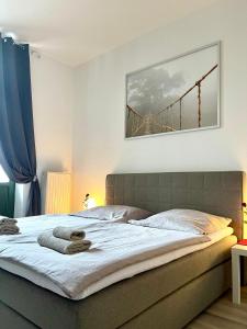 Postel nebo postele na pokoji v ubytování Downtown Apartment 4U Leipzig