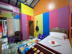 Letto o letti in una camera di Pelemkecut Double-Degree Syariah Accommodation