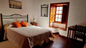 A bed or beds in a room at Neólida