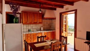 A kitchen or kitchenette at Neólida