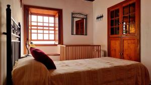 A bed or beds in a room at Neólida