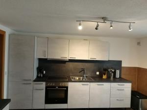 A kitchen or kitchenette at Gästehaus Alberta Még 16 kép