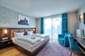 Postel nebo postele na pokoji v ubytování Brauhaus Zum Löwen + 37 fotografií
