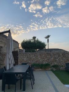 Photo de la galerie de l'établissement Villa Savona 3 Bedroom Villa with private pool, à Ix-Xagħra
