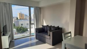 Χώρος καθιστικού στο Amanecerpuertomadryn 2