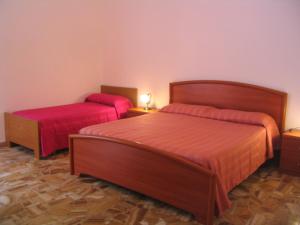 Cama o camas de una habitación en Barbagia Apartment