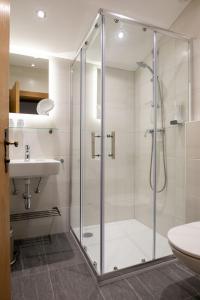 Ванная комната в Hotel Residence Metropol