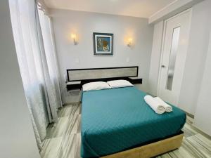 Cama o camas de una habitación en Hostal D' Rosas