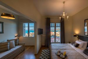 Postel nebo postele na pokoji v ubytování Leto Nuevo Hotel