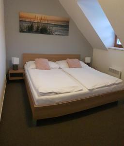 Postel nebo postele na pokoji v ubytování Apartmán Říčky