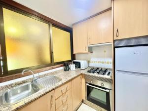 Kuchyň nebo kuchyňský kout v ubytování Albaida Apartment