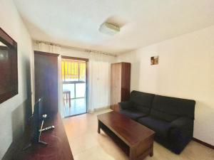 TV a/nebo společenská místnost v ubytování Albaida Apartment