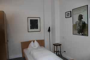 Postel nebo postele na pokoji v ubytování Hotel Drei Kronen
