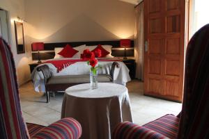 A bed or beds in a room at Drakensview Self Catering