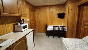 Kuchyň nebo kuchyňský kout v ubytování Penzion apartmány Aninka