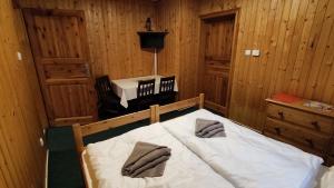Postel nebo postele na pokoji v ubytování Penzion apartmány Aninka