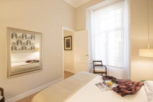 Posteľ alebo postele v izbe v ubytovaní MARITXU'S HOME