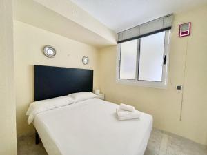 Posteľ alebo postele v izbe v ubytovaní MAGNIFICENT MEDITERRANEO APARTMENT