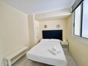 Posteľ alebo postele v izbe v ubytovaní MAGNIFICENT MEDITERRANEO APARTMENT + 27 fotografií