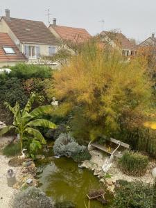 Κήπος έξω από το La Maison Du Bonheur