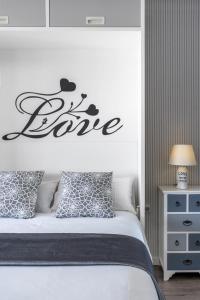 A bed or beds in a room at Studio Playa Paraíso