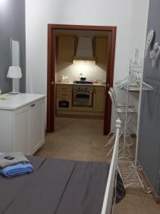 Kuchyň nebo kuchyňský kout v ubytování IL CAMPANILE APARTMENTS