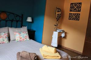 A bed or beds in a room at Casa Begoña